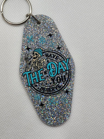 Have the Day You Deserve Motel Keychain